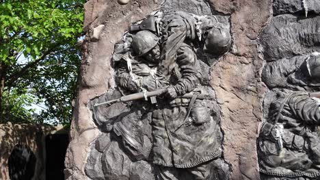 Community-Veterans-Memorial-sculpture-of-soldier-carrying-a-fallen-soldier