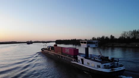 Loaded-Inland-Vessel-Sailing-With-Containers-On-Dutch-River-Oude-Maas-In-Netherlands