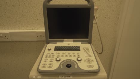 ultrasound-machine-in-human-hospital-with-black-screen-and-keyboard-for-diagnostic-imaging-procedures