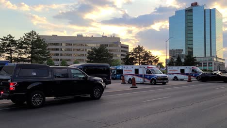 paramedic-care-team-and-police-providing-support-at-the-incident-site-in-urban-area-of-Mississauga,-Canada