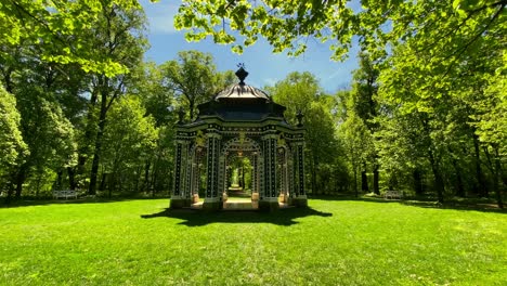The-green-pleasure-house-in-Laxenburg-Palace-Park,-shot-on-a-warm-day-in-spring,-static-shot