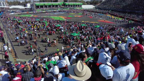 People-running-to-the-track-for-the-podium-celebration-at-the-F1-GP-Grand-Prix-in-Mexico-City
