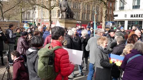 Group-of-people-at-Ukraine-anti-war-activists-protesting-on-Manchester-city-street