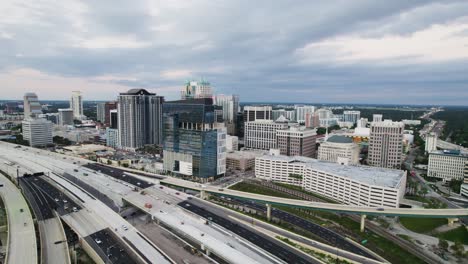 Cinematic-aerial-footage-of-Downtown-Orlando-and-the-I-4-from-the-South-West