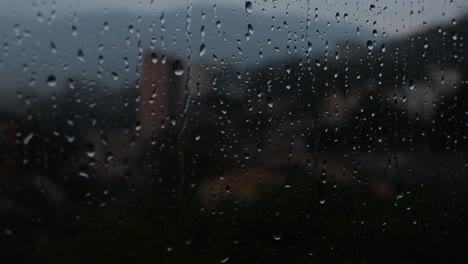 Raindrop-falling-through-a-window-glass