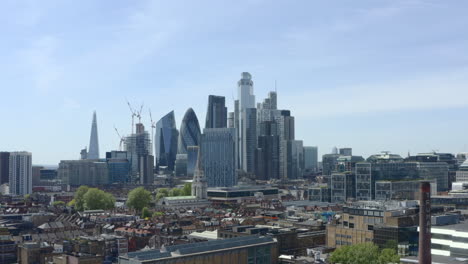 Rising-aerial-shot-of-City-of-London-skyscrapers-from-the-east