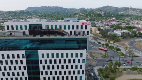 Netflix-Offices,-Aerial-Drone-Shot-of-Netflix-Rooftop-Overlooking-Los-Angeles-Streets-and-Mountain