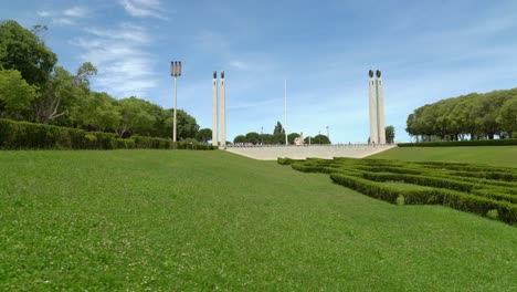 Park-of-Eduardo-VII-offers-views-to-contemplate-the-entire-dimension-of-a-vast-green-garden-with-Monument-to-the-25th-April-Revolution