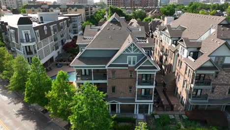 Aerial-pullback-of-large-apartment-building-residential-homes-in-USA