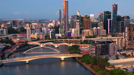 Go-Between-Toll,-Merivale-Railway,-And-William-Jolly-Bridges-Over-Brisbane-River-With-Central-Business-District-In-QLD,-Australia