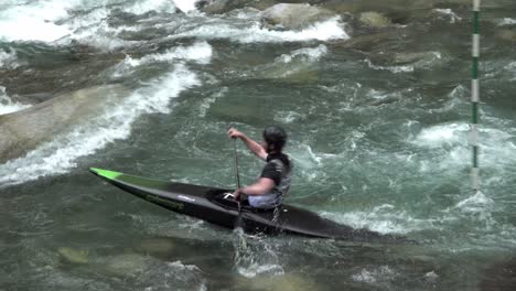 A-canoeist-riding-through-obstacles-during-a-competition