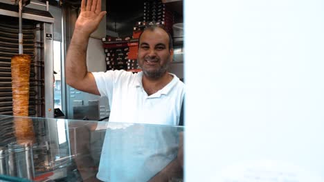 4k-2-men-at-a-kebab-shop-posing-in-front-of-camera