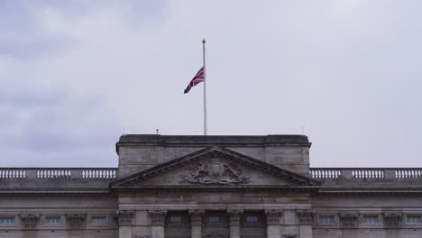 Buckingham-Palace-Union-Jack-flies-at-half-mast-to-mark-the-death-of-Prince-Philip,-Duke-of-Edinburgh,-Saturday-April-10th,-2021---London-UK