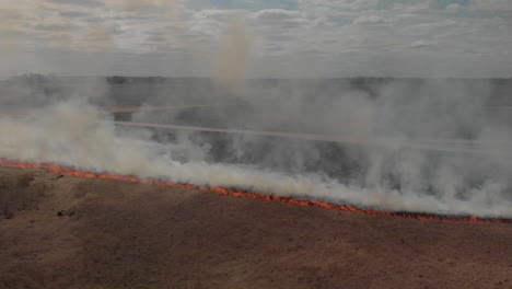 Grassland-field-on-fire-with-smoke