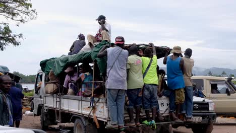 Crowded-public-transport-with-lots-of-people-on-a-truck-on-tropical-island-of-Autonomous-Region-of-Bougainville,-Papua-New-Guinea