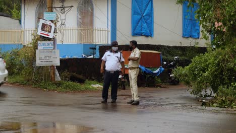 Indian-Police-Officer-Wearing-Covid-19-Face-Mask-Walks-from-Car-at-Traffic-Stop