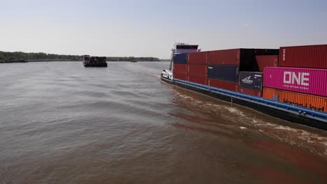 Barge-Ship-Loaded-With-Stack-Of-Cargo-Containers