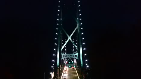 Stationary-shot-of-Lions-Gate-Bridge-in-Vancouver-at-night