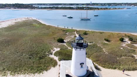 People-At-The-Lighthouse-Beach-With-Edgartown-Harbor-Light-In-Edgartown,-Massachusetts,-USA