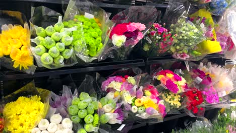 Flower-rack-fridge-in-florist-shop-market-to-keep-beautiful-colorful-bouquet-flowers-cool-at-the-right-temperature-in-warehouse-store-open-fridge