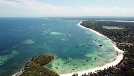 Spectacular-aerial-view-of-bay-with-tropical-white-sandy-beach-and-popular-holiday-resort