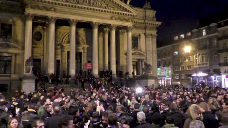 People-gathered-in-front-of-the-Stock-Exchange-to-remember-the-victims-of-the-terrorist-attacks-on-Brussels-Airport-and-Metro-Maelbeek-earlier-that-day---Belgium