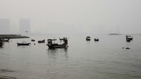 Boats-at-Penang-pier-on-cloudy-and-foggy-afternoon