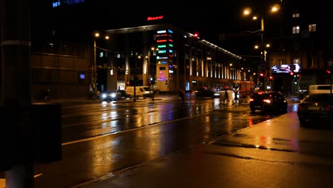 Night-view-Tallinn-city-centre-street-with-cars-and-public-transport