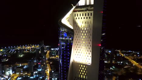 Descending-Cinematic-Shot-of-the-Tallest-Building-in-Kuwait-City