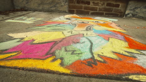 Sidewalk-chalk-art,-Close-Up,-Slide-Right