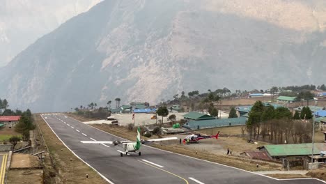 Lukla,-Nepal---March-9,-2021:-A-plane-leaving-the-Lukla-Airport-in-the-Himalaya-Mountains-of-Nepal
