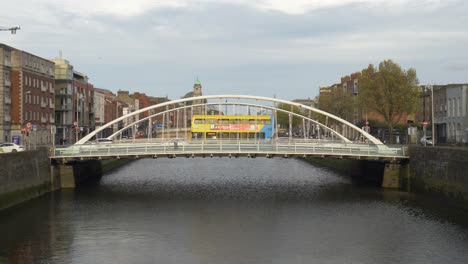 Vehicles-Pass-Through-The-James-Joyce-Road-Bridge-Located-In-Dublin,-Ireland