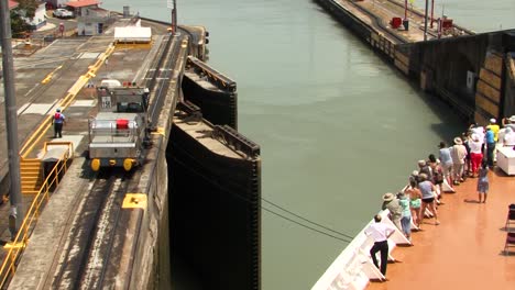 Cruise-ship-slowly-being-pulled-through-the-Pedro-Miguel-Locks