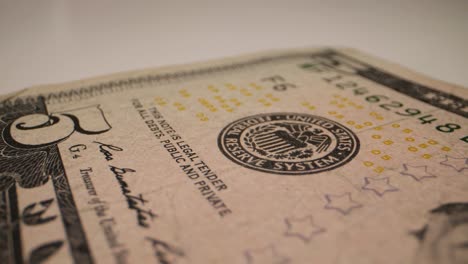 closeup-of-United-States-five-dollar-bill