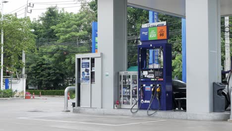 The-car-was-filling-up-at-the-gas-station-PTT-in-Bangkok,-Thailand