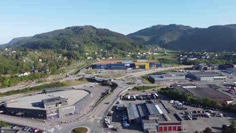 Asane-district-outside-Bergen-with-traffic-and-industrial-area-including-shops-Ikea-and-Gullgruven---Aerial-overview-Asane-Nyborg-Bergen-Norway
