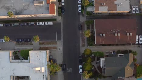 Aerial,-driving-through-the-city,-drone-view