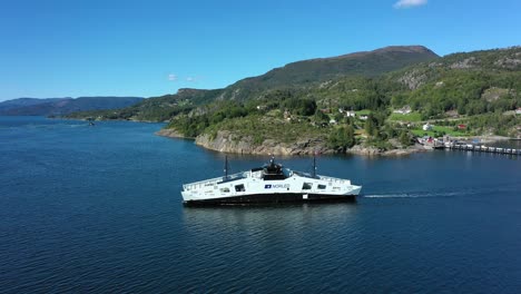 Modern-ship-Hydra-crossing-sea-from-Hjelmeland---Groundbreaking-new-technology-with-zero-emission---liquid-Hydrogen---Sunny-day-aerial-view-of-ship-from-Norled-Company-Norway