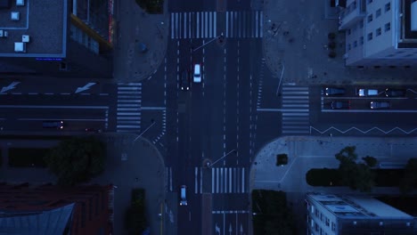 Drone-video-of-a-road-intersection-from-overhead-in-Mokotow,-Warsaw,-Poland