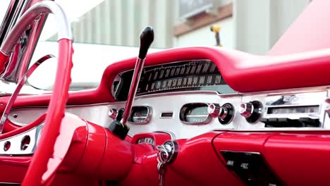 Red-Chrome-Trim-of-Chevrolet-Impala-1958-Classic-Car-Dashboard-Controls-and-Steering-Wheel