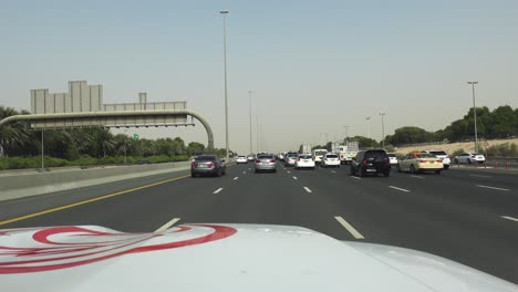POV-Slow-Driving-Along-Busy-Dubai-D72-Highway-Road