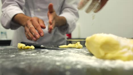 Hands-Of-Busy-Chefs-In-The-Kitchen-Preparing-Pastry-Food-For-Dessert