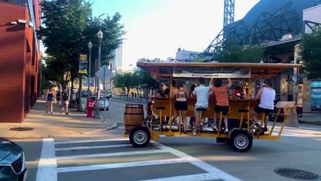 Pittsburgh-Party-Pedaler,-Pittsburgh's-original-party-bike-with-16-person-party-on-wheels-in-Pittsburgh-Downtown,-Pennsylvania