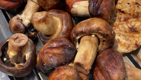 healthy-vegetarian-barbecue-mushrooms-closeup-slow-motion