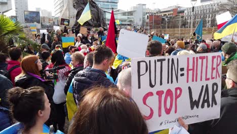 Crowd-of-people-at-Ukraine-anti-war-protest-demonstration-on-Manchester-city-street