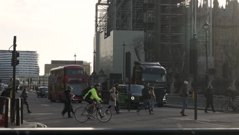 Traffic-Coming-To-Stop-At-Traffic-Lights-At-Bridge-Street-To-Allow-Pedestrians-To-Walk-Across-Outside-Westminster-Station