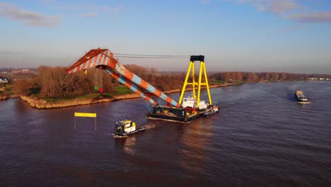 Tug-Boat-Pulling-Hebo-Lift-9-Large-Floating-Crane-Along-Oude-Maas