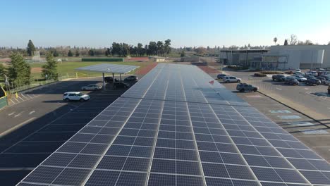 Drone-Fly-Over-Solar-Panels-Covering-Parking-Spaces