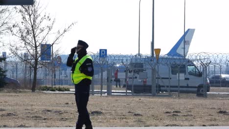 US-President-Joe-Biden's-plane-on-the-runway-in-the-Polish-city-of-Rzeszow-Jasionka-secured-by-police-in-uniforms-and-reflective-vests