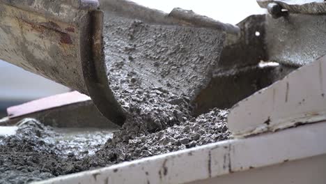 Cement Pouring From A Mixer Truck Chute High-Res Stock Photo